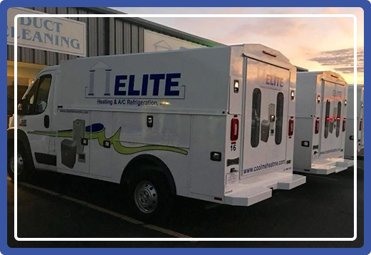 three work trucks parked together with the elite logo